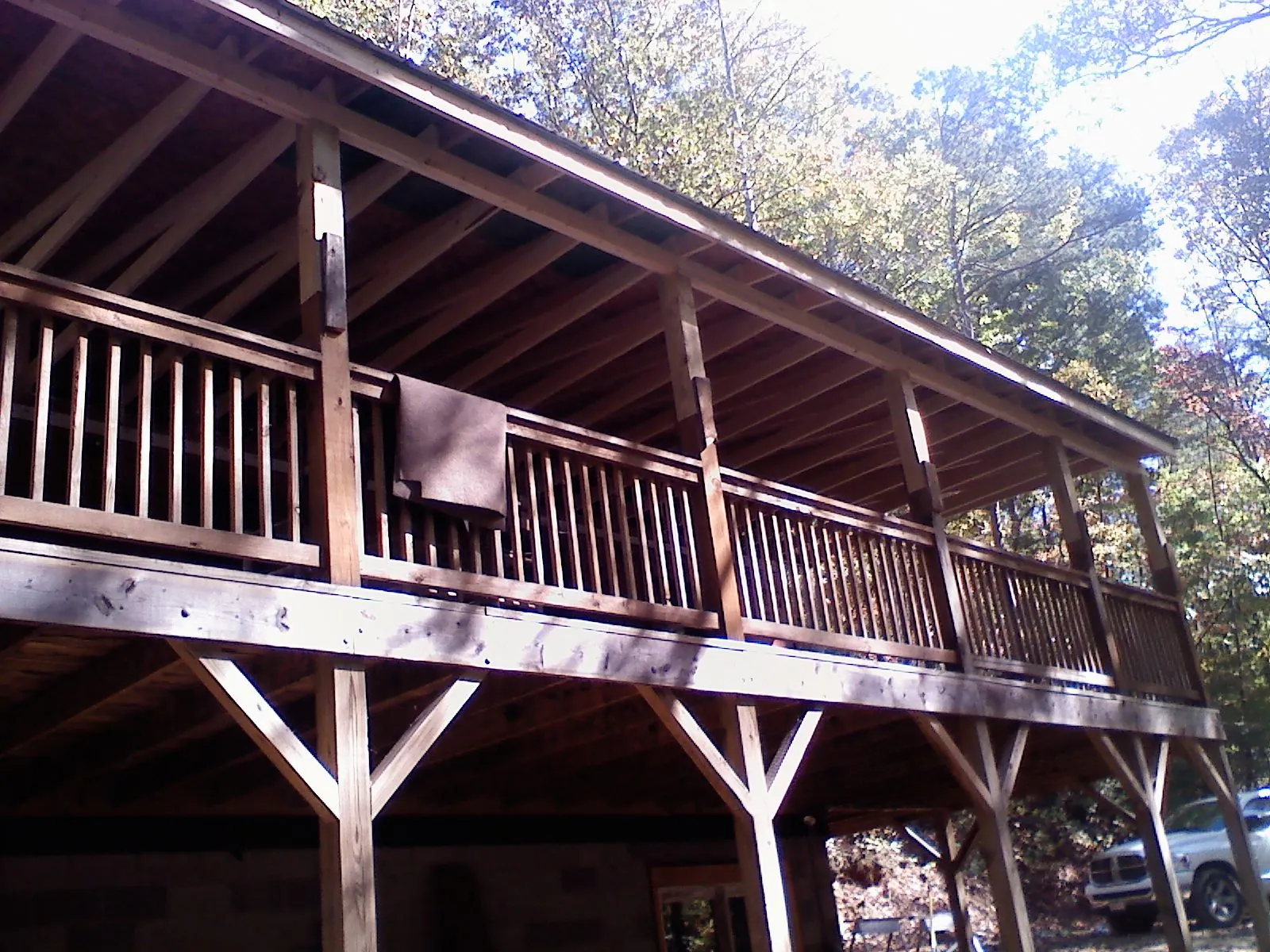 Timber framing under a new elevated porch and deck — Roof Leak Repair in Lombard by Roofing Brothers